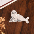 Eco-friendly acetate hair claw with a marine animal aesthetic