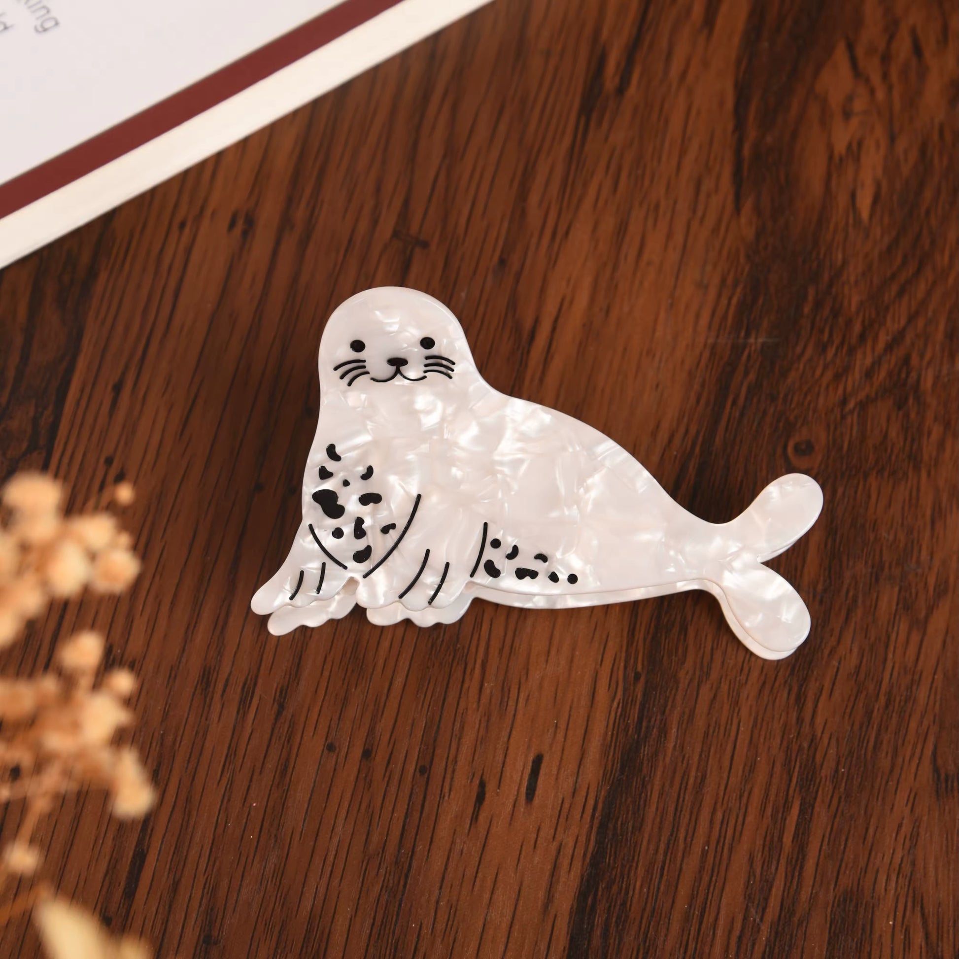 Eco-friendly acetate hair claw with a marine animal aesthetic