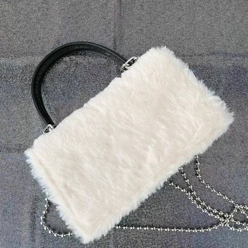 Black gothic crossbody bag with chain for soft punk outfit
