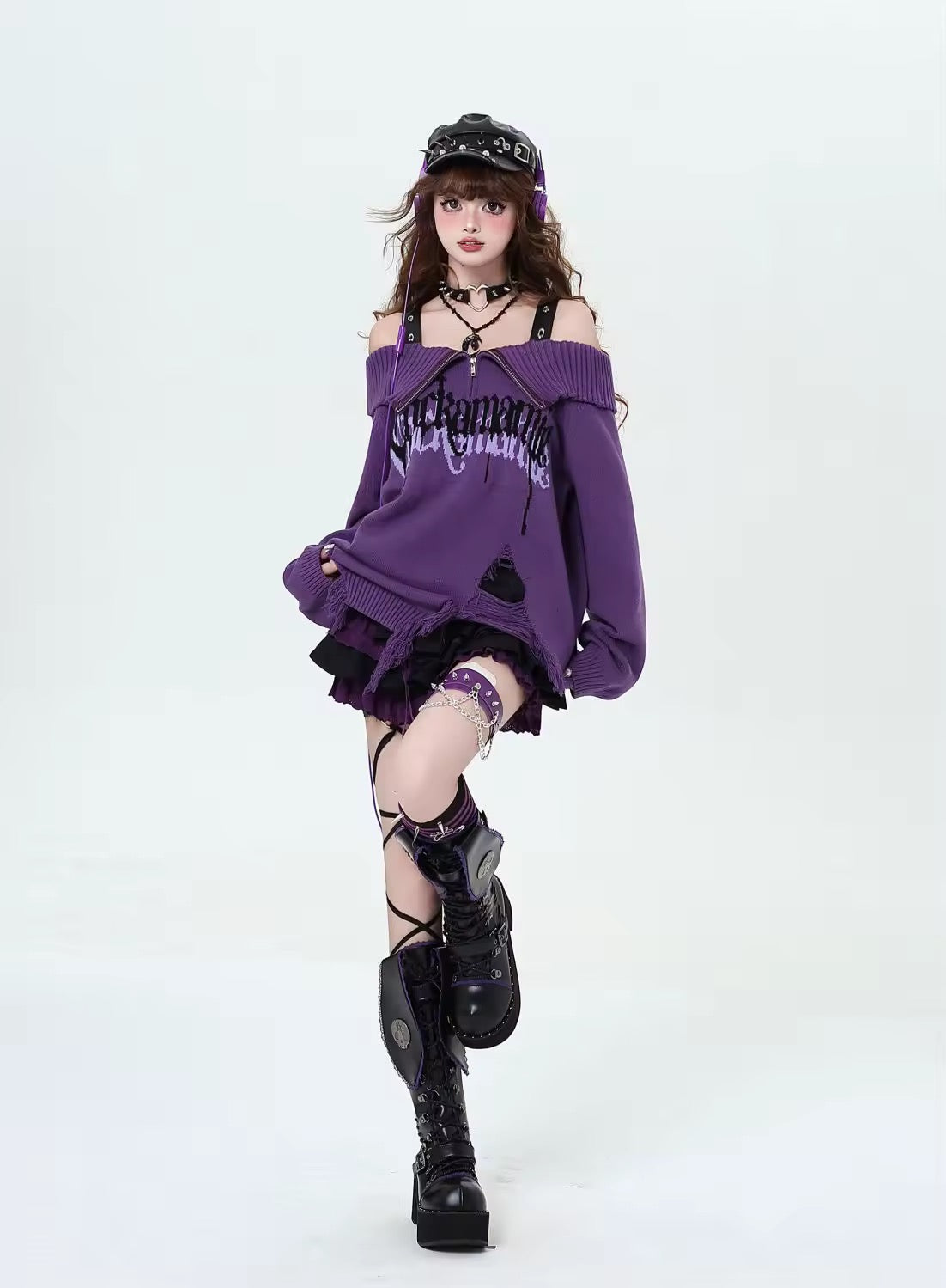 Oversized distressed grunge knitwear with bold lettering and graphics