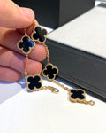V-Gold black clover bracelet with shiny gold finish