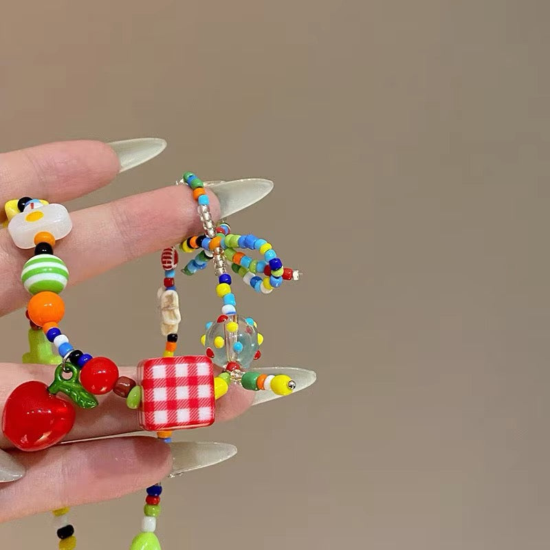 Harajuku fruit bow choker featuring colorful sugar beads and cute cartoon designs, perfect for Y2K outfits and alternative aesthetic styling