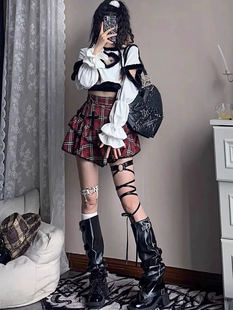 E-girl red plaid mini skirt with high-waisted ruffle details for punk and gothic fashion lovers