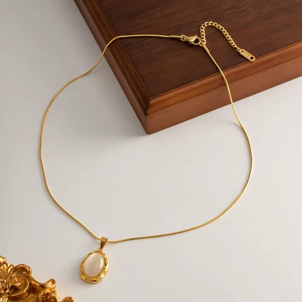 Luxury statement necklace featuring a white opal pendant