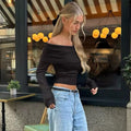 Soft and stretchy white ribbed knit pullover
