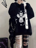 Side angle showcasing the oversized sleeve and fluffy comfortable knit.