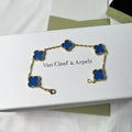 V-Gold blue enamel bracelet with lucky clover design