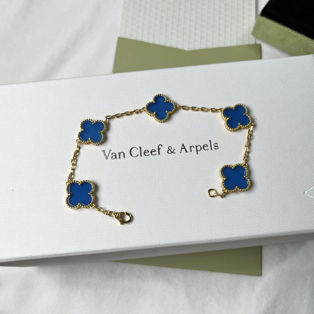 V-Gold blue enamel bracelet with lucky clover design