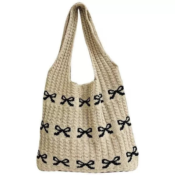 Soft Girl Beach Bag placed on a beach towel, illustrating its summer vibe.

