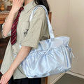 Interior of satin coquette bag showing spacious storage