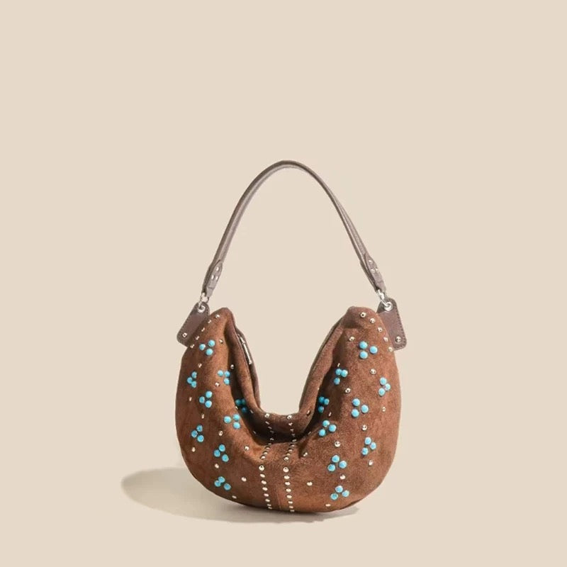 Festival-ready fashion bag with retro tribal elements