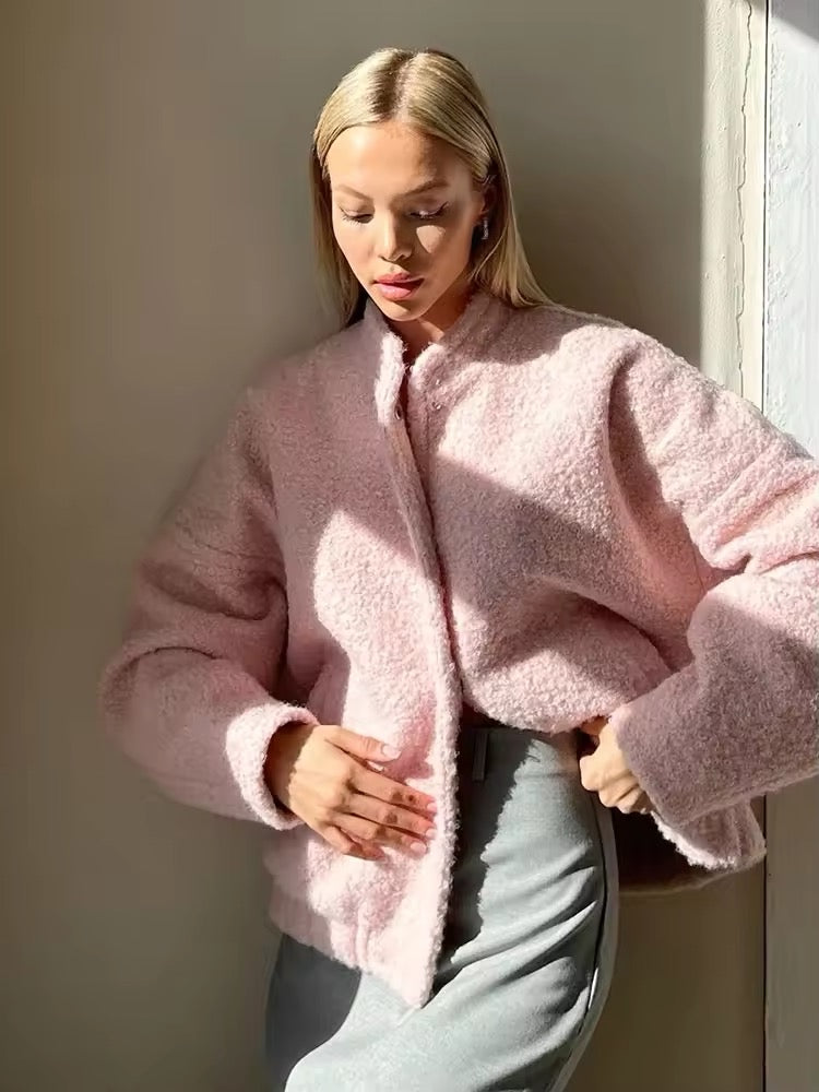 Women’s pastel pink coat with functional pockets and fluffy material, comfy and elegant style
