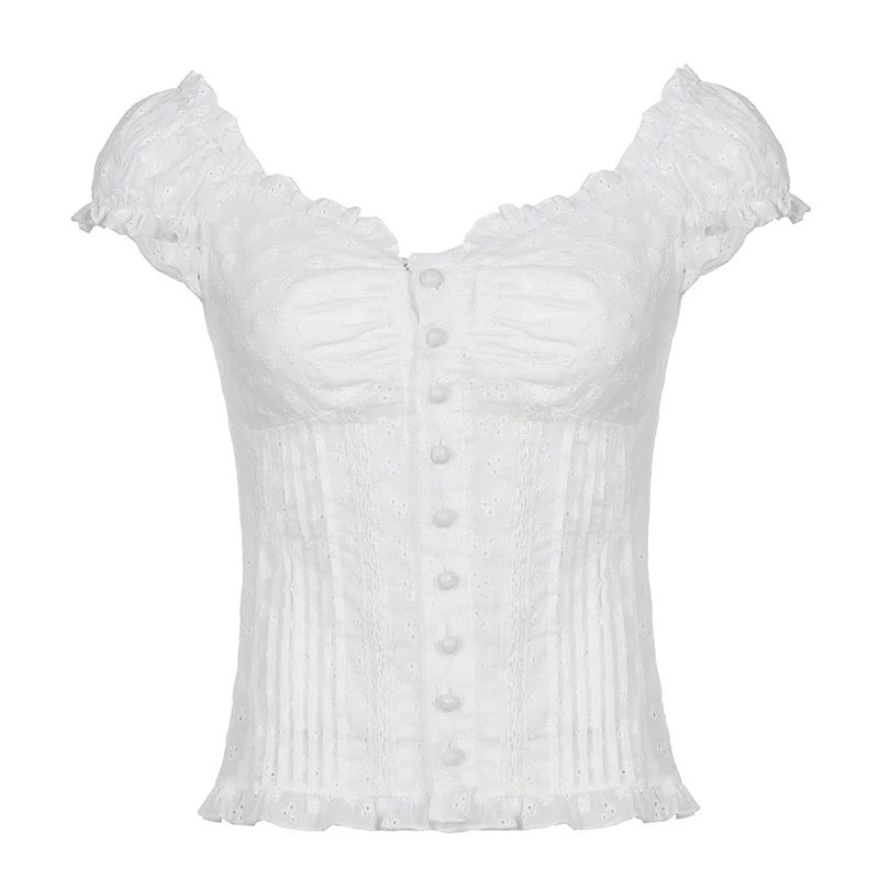 White coquette crop top with floral texture and romantic button detail