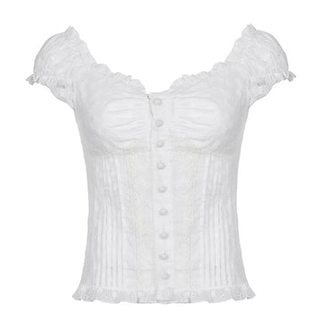 White coquette crop top with floral texture and romantic button detail