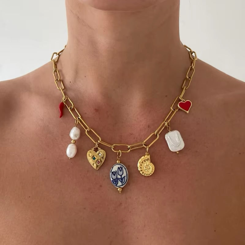 18K gold-plated charm necklace with pearl and conch pendant