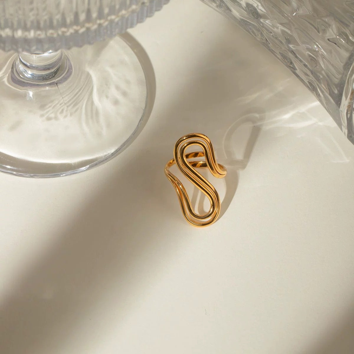 Adjustable open-end ring with gold and silver finish