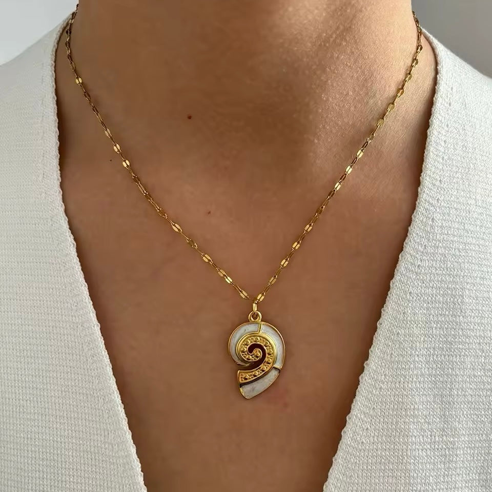Minimalist mermaidcore necklace featuring a gold starfish charm