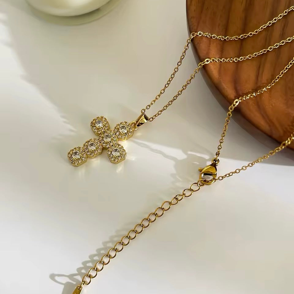 Stainless steel cross pendant with shiny zircon stones