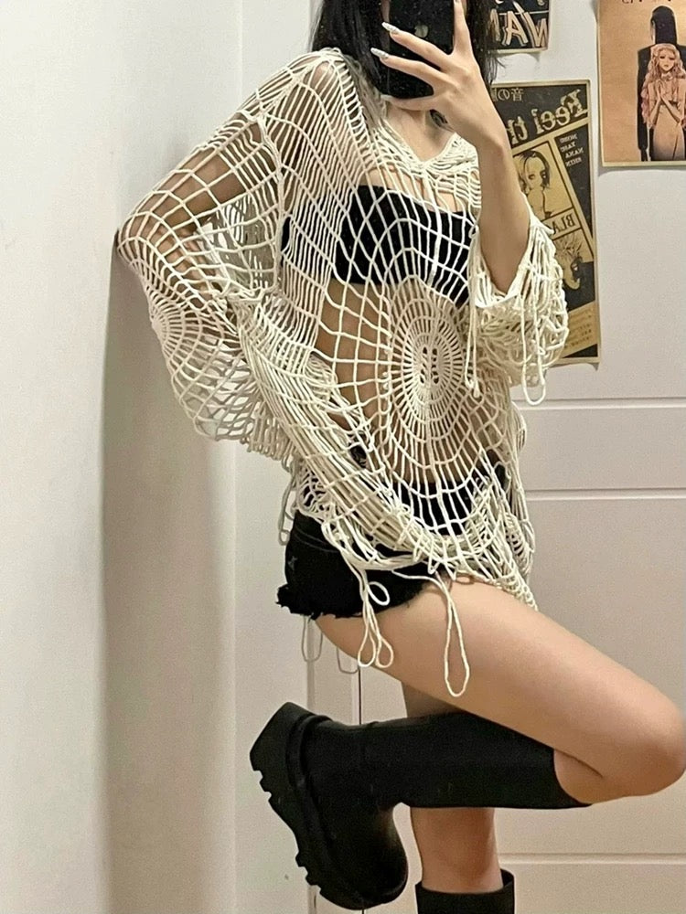 Gothic knit pullover with spider web pattern and loose threads, perfect for dark streetwear and festival outfits