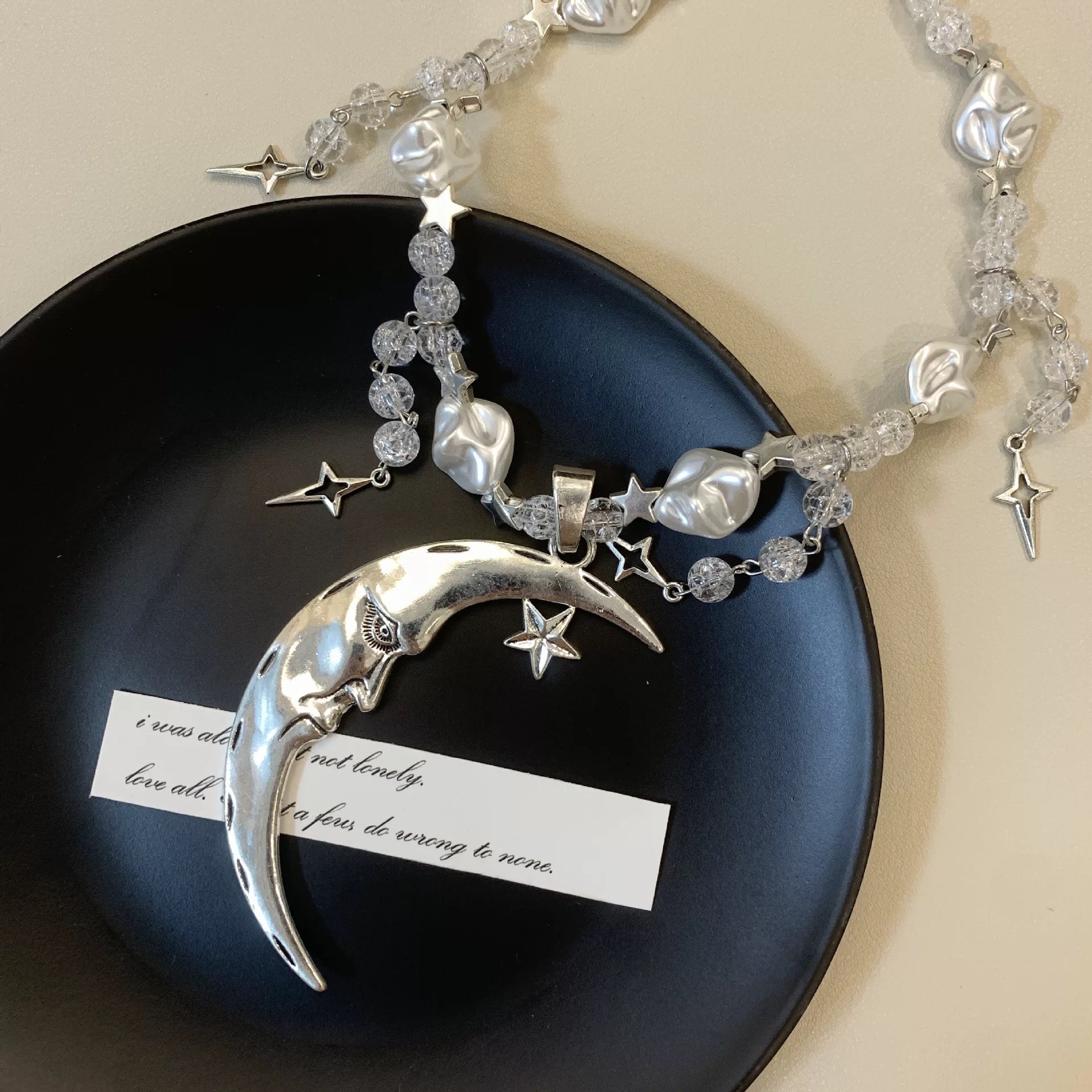 Aesthetic celestial jewelry necklace with moon and star pendant, trendy Y2K pearl choker for gothic fashion, mystical style, and witchcore outfits