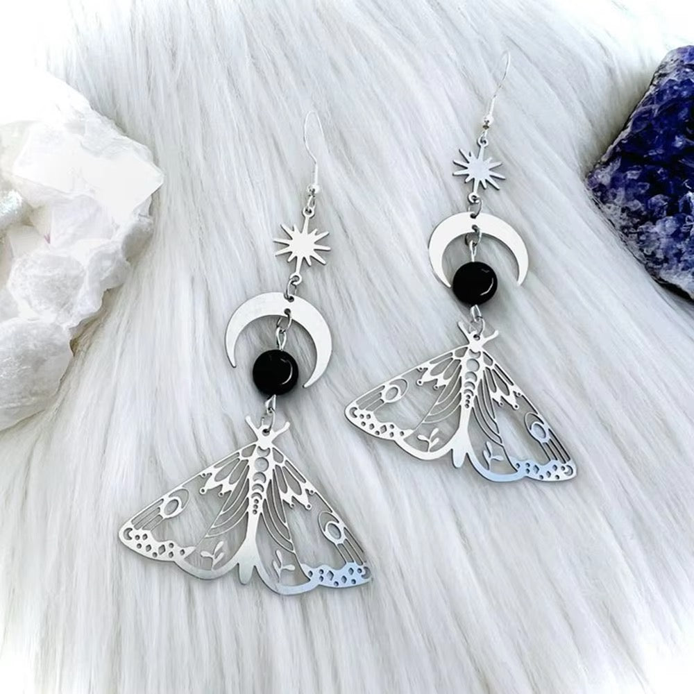 Handmade bohemian earrings with mystical moth and moon charms
