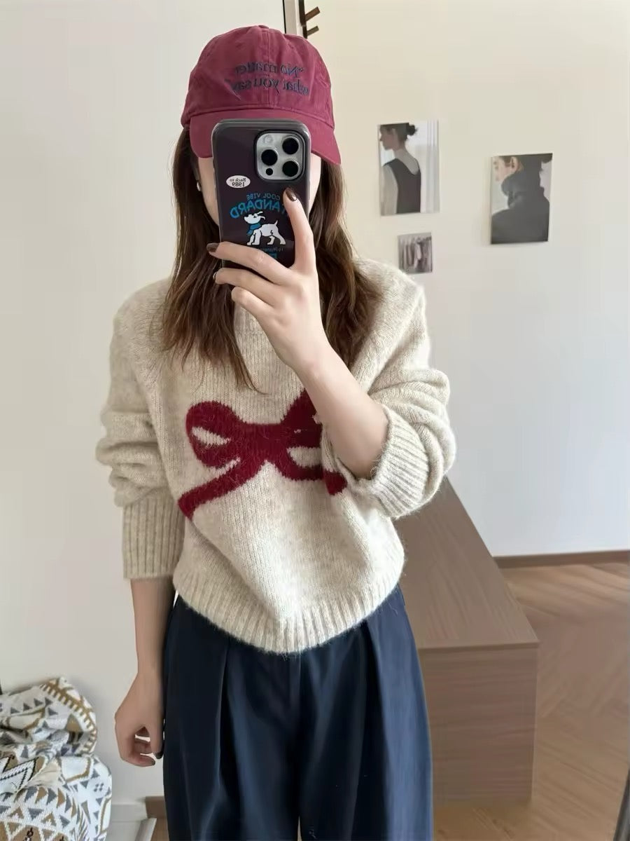 Feminine coquette pullover styled with pleated skirt