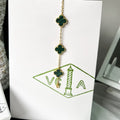 Green clover bracelet with 18K gold plating and enamel detail