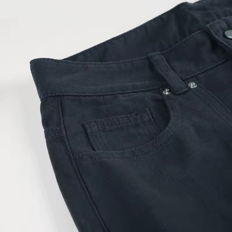 Model styling the Y2K jeans with a crop top for a trendy streetwear look.