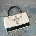 Grunge aesthetic purse featuring cross detail and alt punk style
