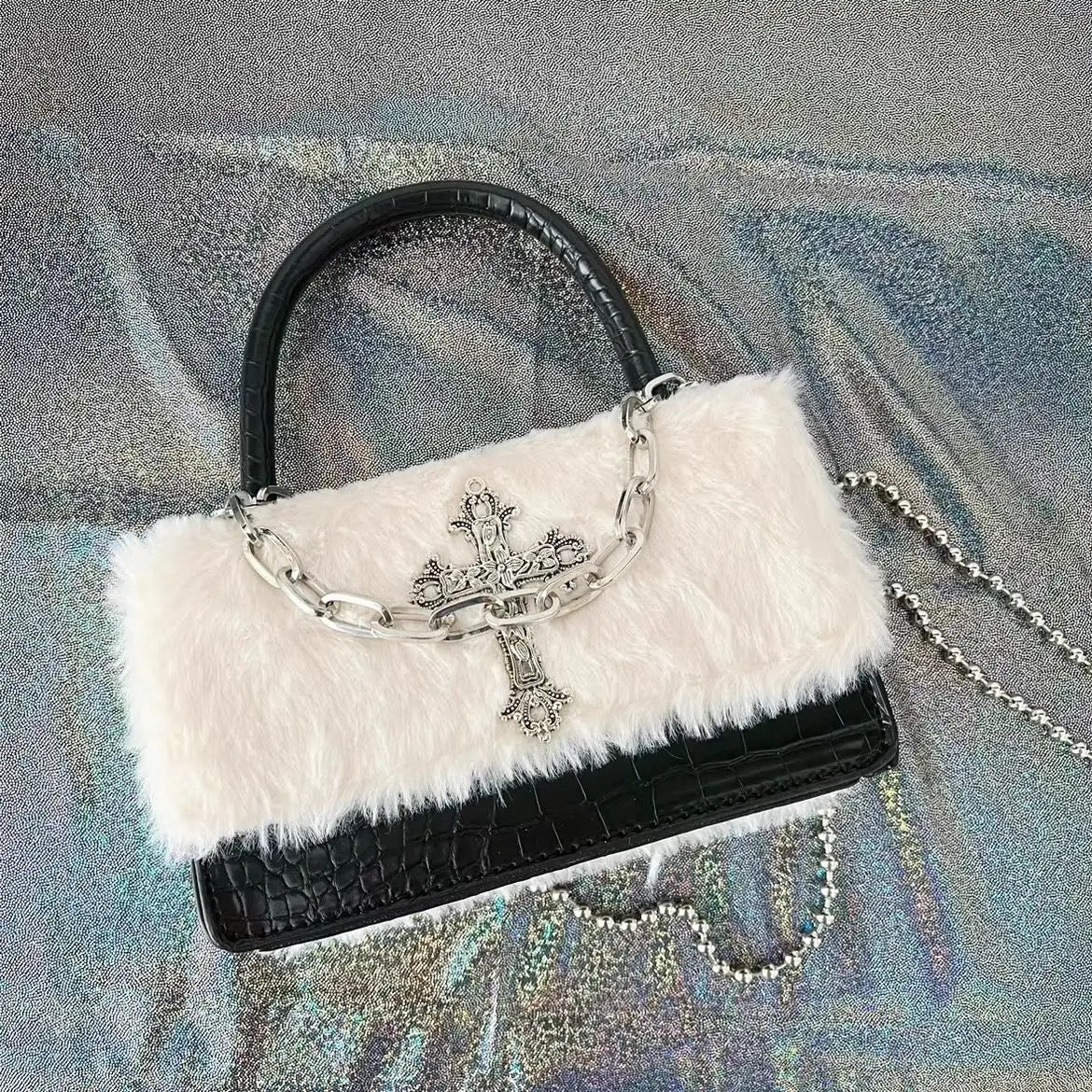 Grunge aesthetic purse featuring cross detail and alt punk style