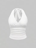 White halter top on a gray background
