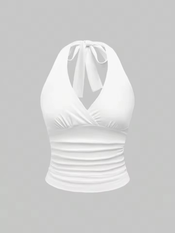 White halter top on a gray background