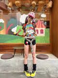 Close-up of the colorful Hello-Kitty style graphic showing retro cartoon details on cotton fabric.