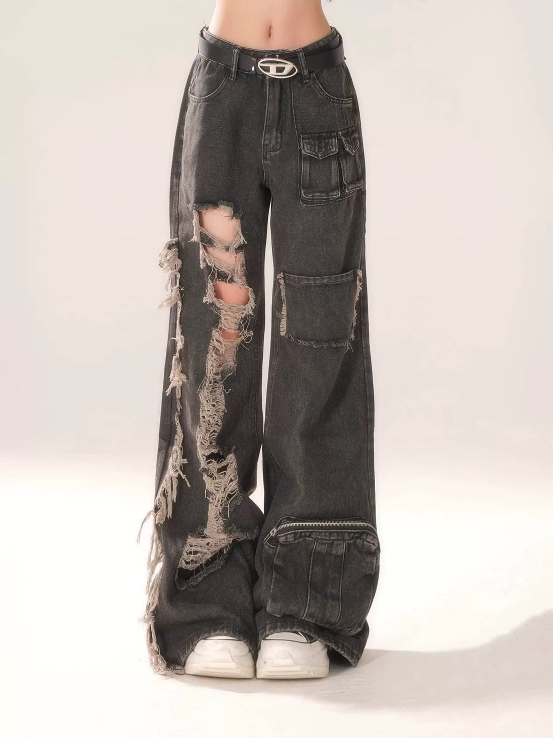Detail shot of the waistband, showing the sturdy stitching and button closure.