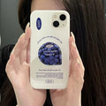 Close-up of folding stand on glossy blueberry iPhone case