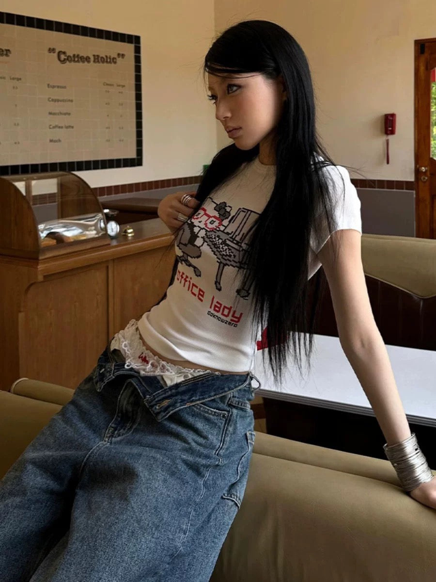 Japanese streetwear outfit featuring the Hello Kitty tee with high-waisted jeans