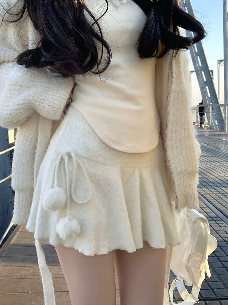 High waist white lace-up mini skirt with ruffle hem