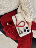The case fitted on an iPhone, demonstrating its snug fit and stylish appearance.