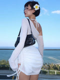Elegant lace-up mini dress for clubwear and vacation looks