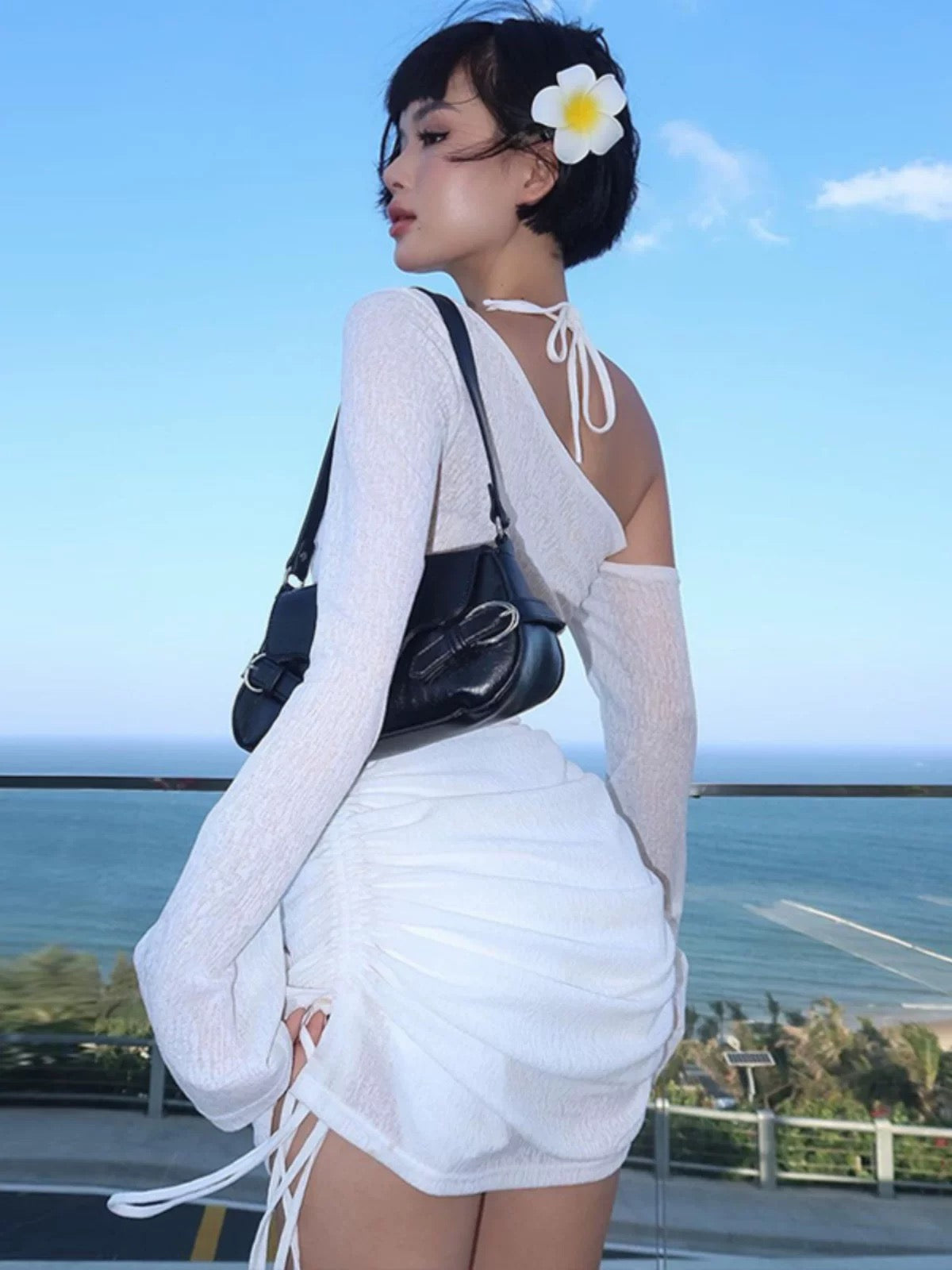 Elegant lace-up mini dress for clubwear and vacation looks
