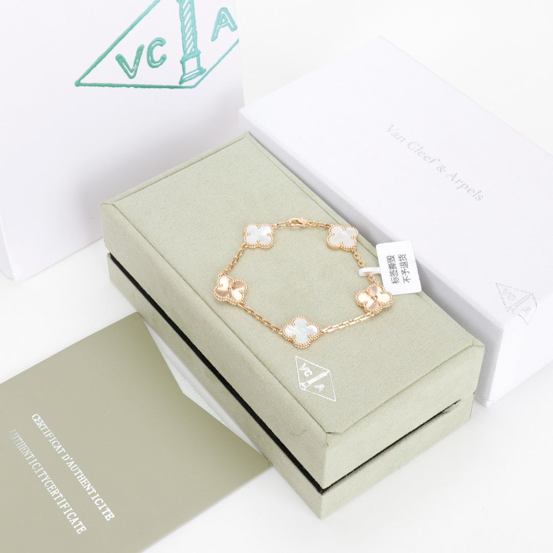 Laser pearl clover bracelet with white enamel charm and 18K gold