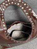 Elegant grunge bag with motorcycle hardware style