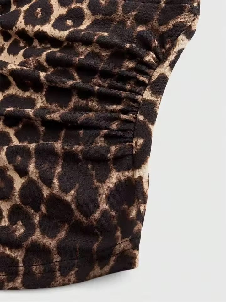 Leopard print halter top on a light gray background