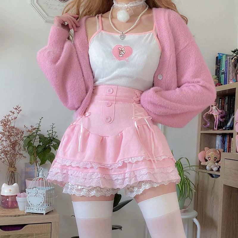 Pink kawaii Lolita mini skirt with lace detail and built-in shorts