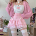 Pink kawaii Lolita mini skirt with lace detail and built-in shorts