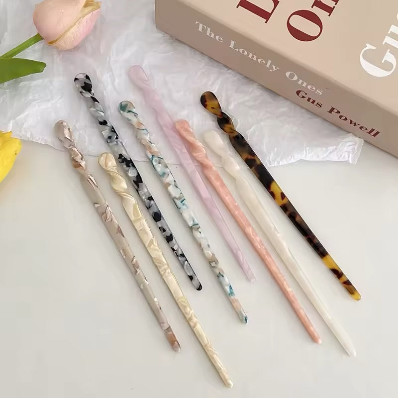 Long acetate hair stick for creating stylish buns