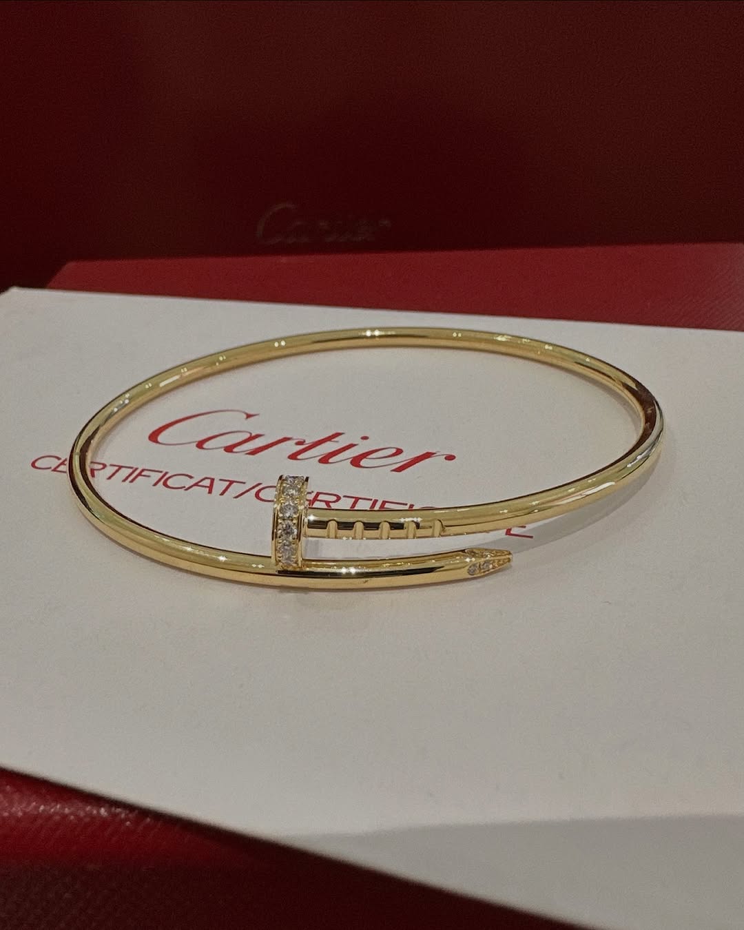 Waterproof gold bracelet with crystals and nail-inspired design