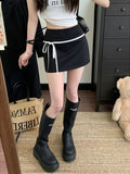 Side view of black patchwork mini skirt