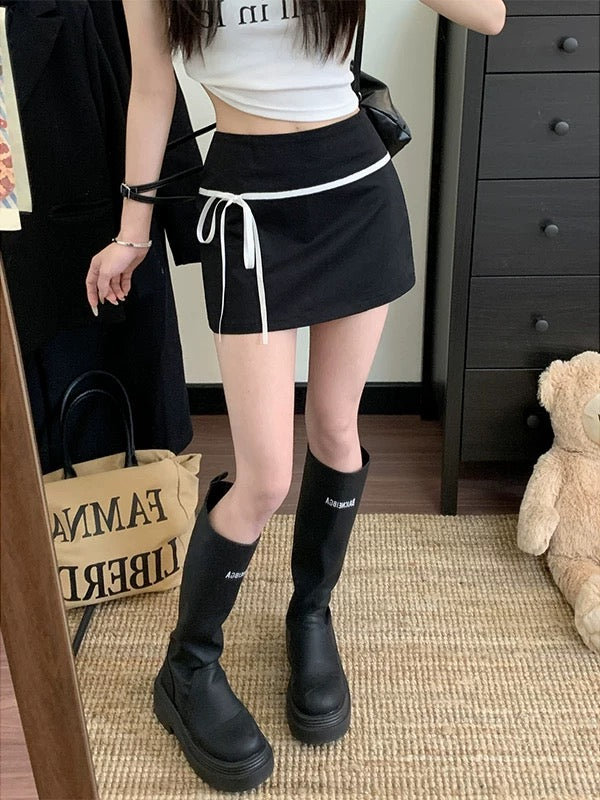 Side view of black patchwork mini skirt