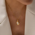 Elegant baroque pearl and cat eye opal stone necklace